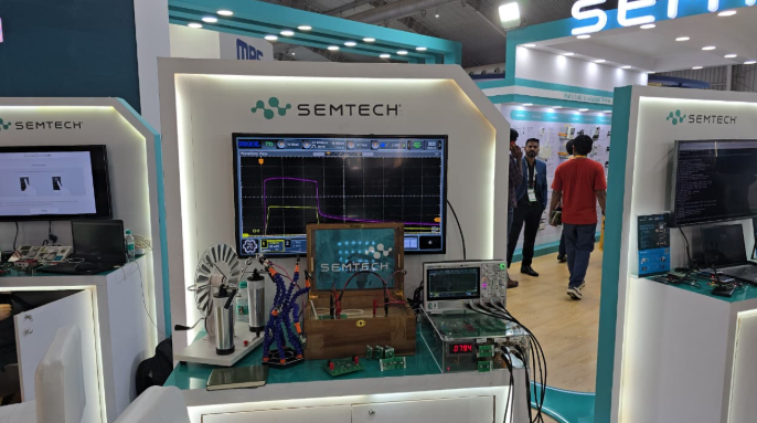 Semtech circuit protection solutions demonstration at Electronica India 2025, featuring SurgeSwitch TVS diode technology and HotSwitch eFuse devices with live surge protection testing displays