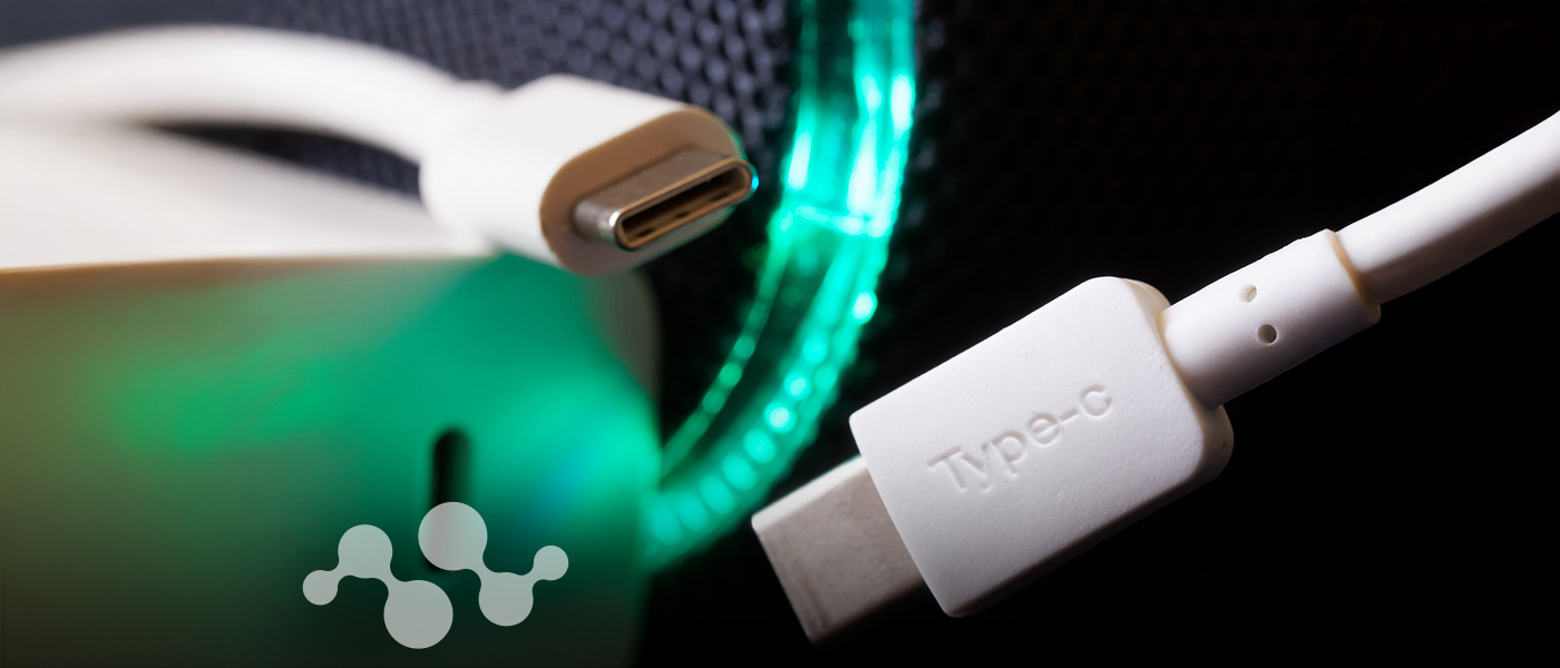 Close-up of a USB Type-C cable with a glowing green background, symbolizing connectivity and technology. The Semtech logo is visible on the left side of the image.